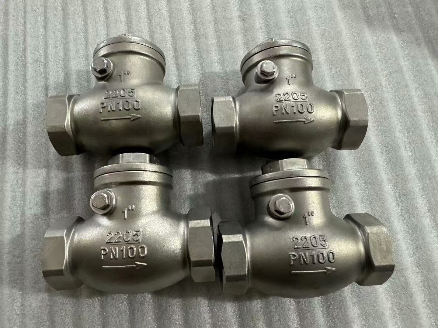 threaded counter weight check valve